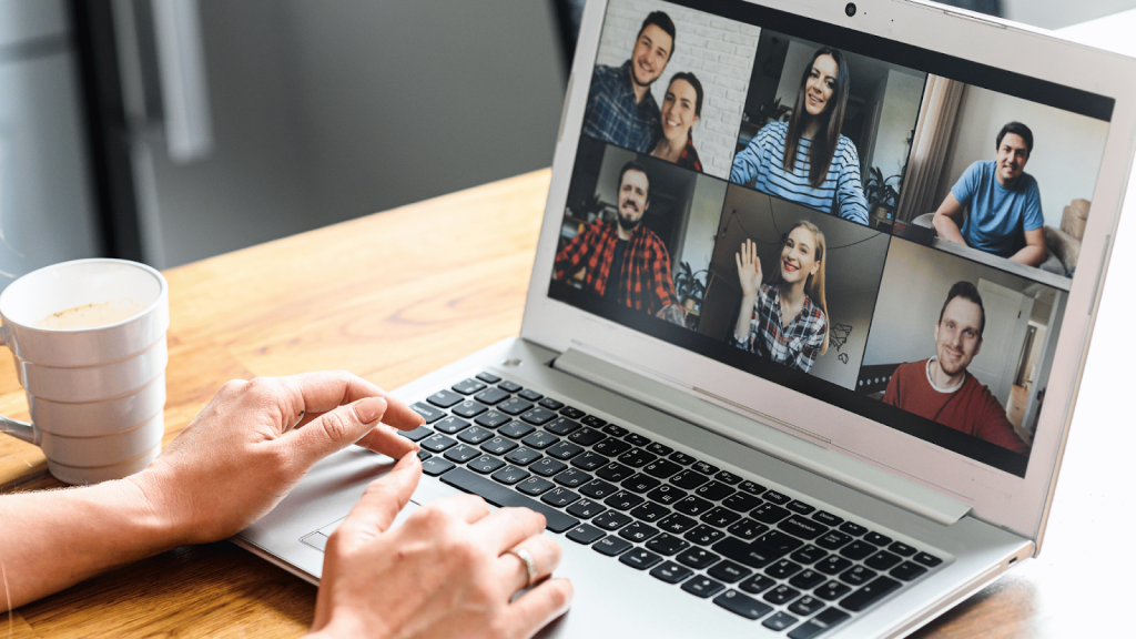 a woman talking to seven of her friends in a Zoom meeting