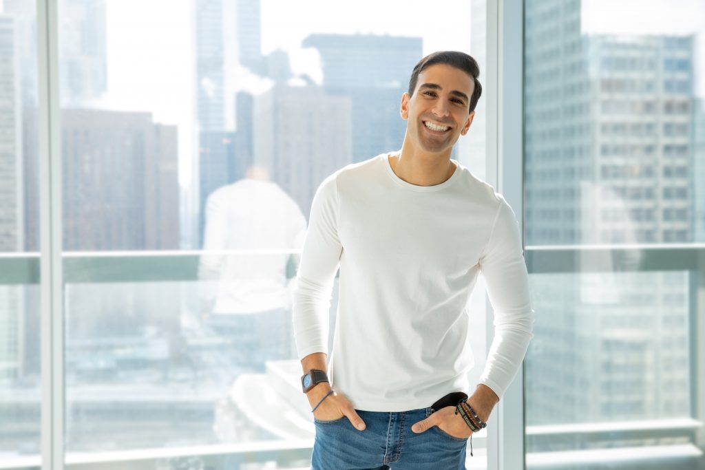 startup founder standing in luxurious office