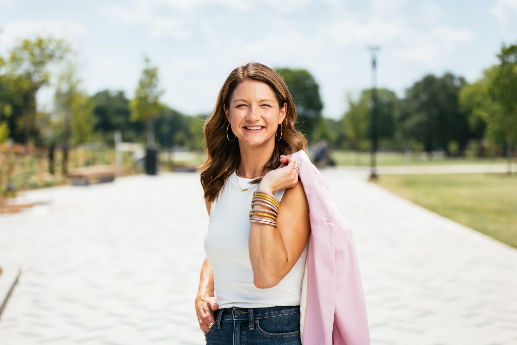 portrait of Erin Mehagan with pink blazer